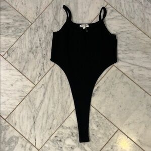 Black Bodysuit with Scoop Neckline and High-Cut Design